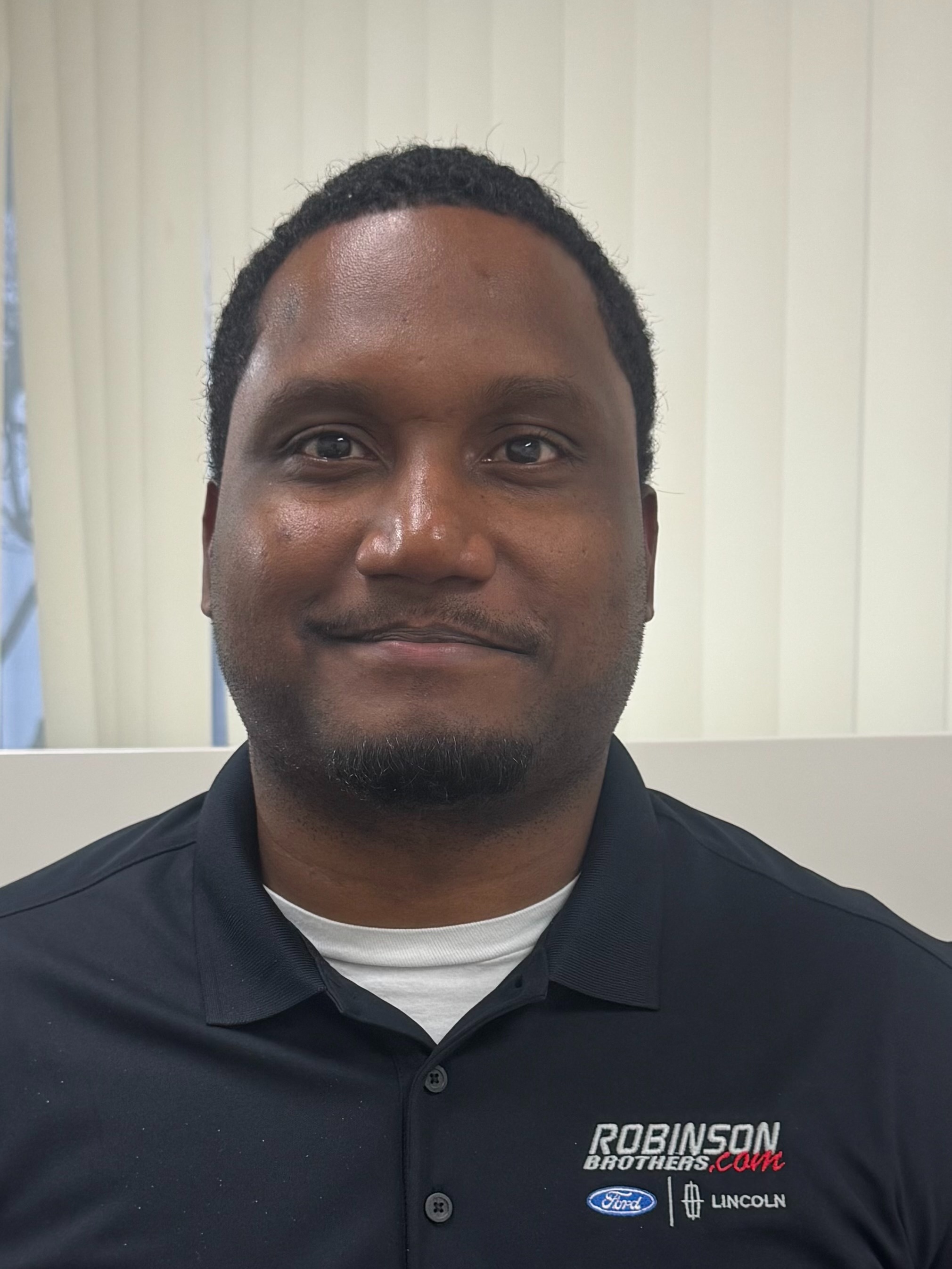 Pre-Owned Sales Consultant Hugh Patin in Used Car Sales Department at Robinson Brothers Ford